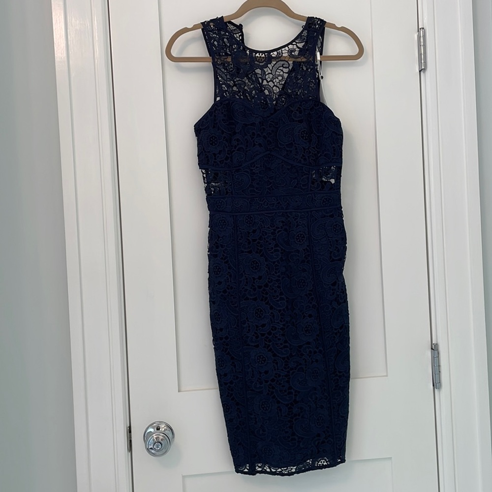Likely navy lace dress with tags